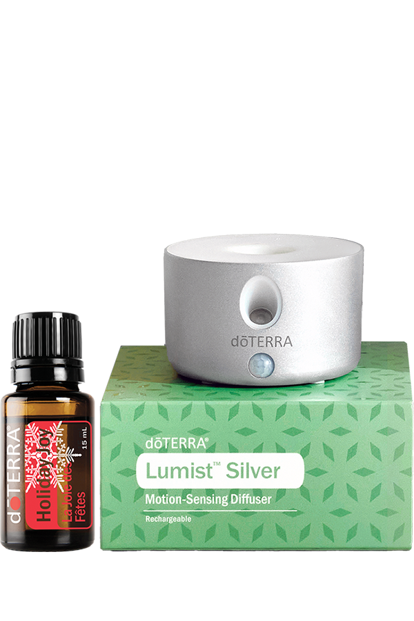 Diffuseur Lumist Silver doTERRA rechargeable avec détecteur de mouvement, présenté avec la synergie Holiday Joy 15 ml et sa boîte.