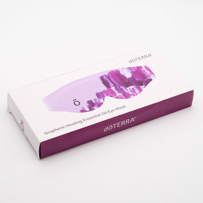 Boîte blanche et mauve du masque oculaire chauffant doTERRA aux huiles essentielles, avec visuel du masque sur le dessus.