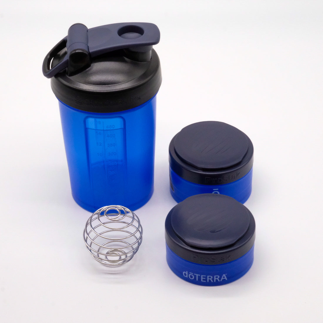 Bouteille shaker bleue doTERRA avec couvercle noir, deux compartiments vissables et fouet bille en métal.