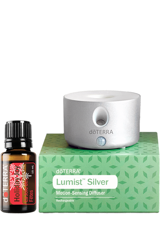Diffuseur Lumist Silver doTERRA rechargeable avec détecteur de mouvement, présenté avec la synergie Holiday Joy 15 ml et sa boîte.