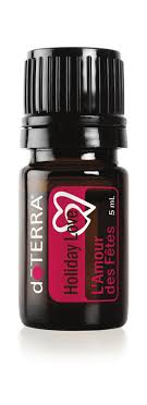 Huile Holiday Love doTERRA 5 ml, petit flacon ambré avec étiquette rouge et bouchon noir.