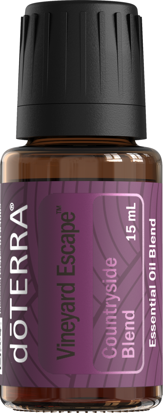 Huile Vineyard Escape de doTERRA 15 ml, flacon ambré avec étiquette mauve et bouchon noir.