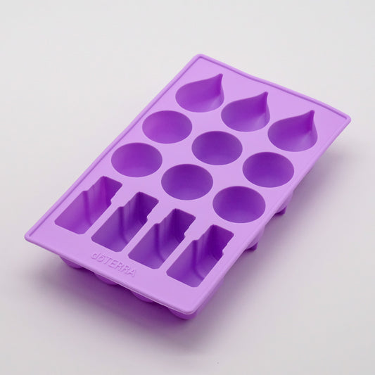 Moule en silicone violet doTERRA avec empreintes en forme de gouttes, de ronds et de flacons.
