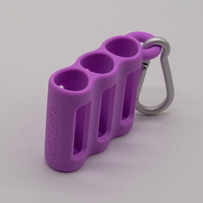 Porte-rouleaux à bille triple violet doTERRA avec mousqueton gris.