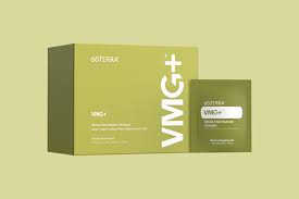 VMG+ de doTERRA, avec boîte verte et sachet individuel assorti, présenté sur fond vert pâle.